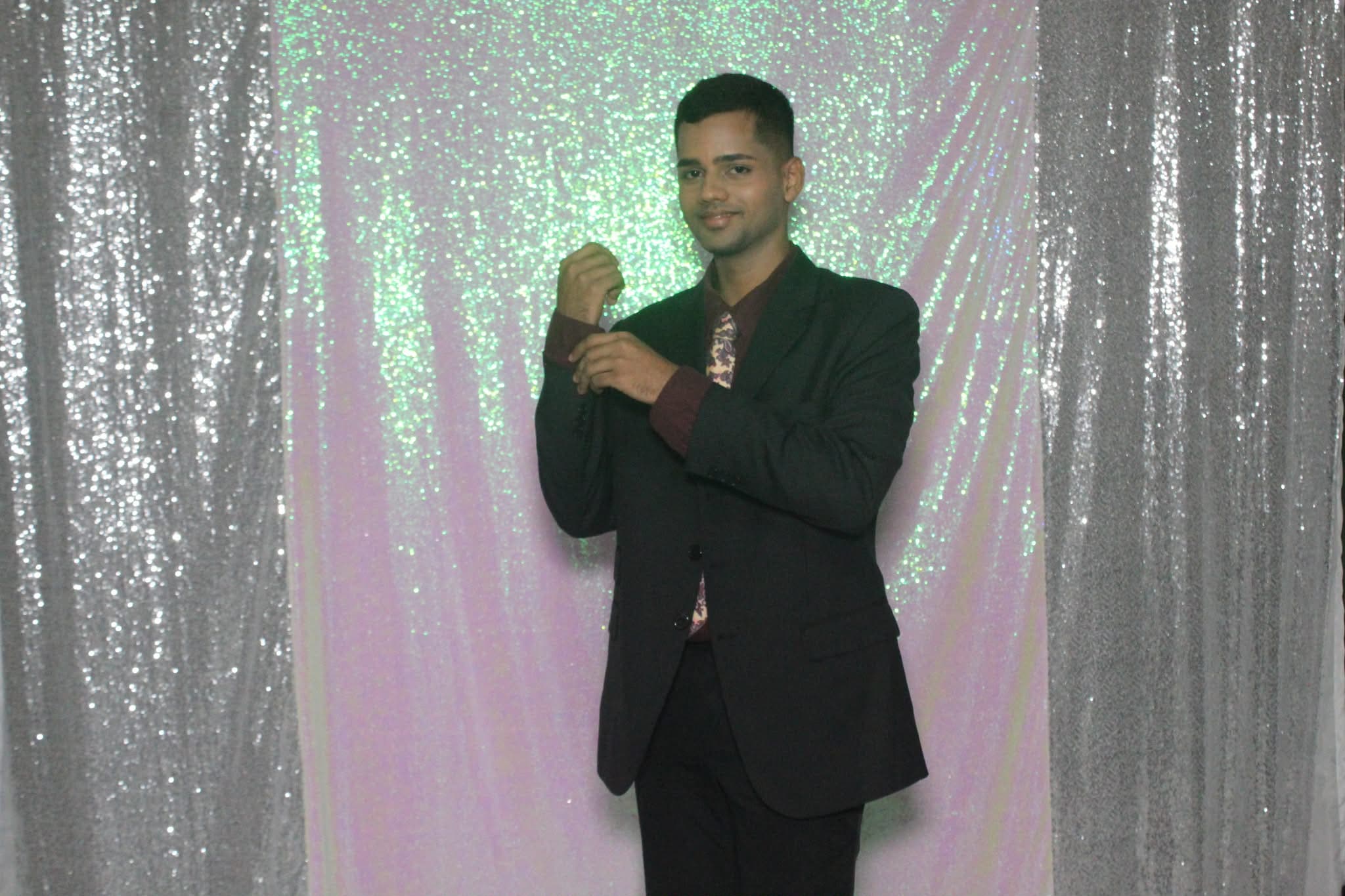 Velu Murugan formal pose